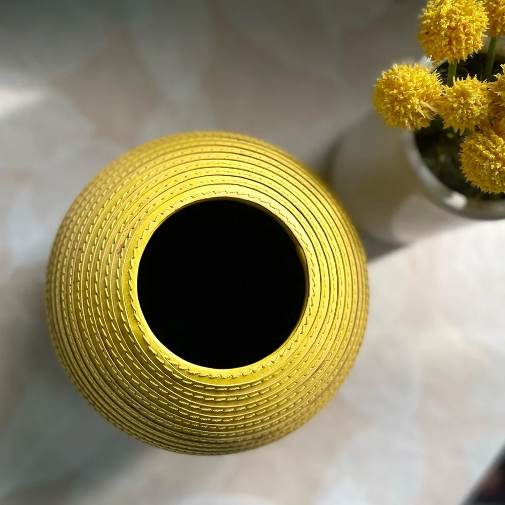 Crate & Barrel Yellow Leather Round Vase.